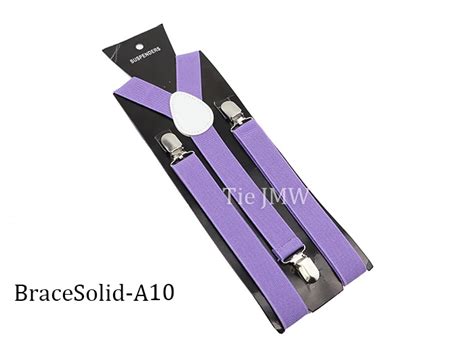 Vêtements lingerie Bretelles Élastiques en Cuir de Couleur Unie Bleu Noir ou Rouge pour Homme