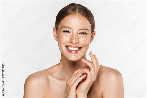 Image Of Alluring Half Naked Woman Smiling At Camera And Holding Hands Together Stock Photo