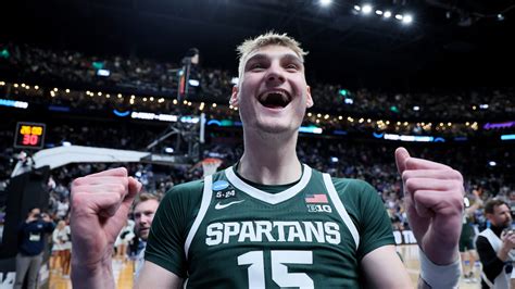 LOOK: MSU basketball center Carson Cooper dunks Tom Izzo in water tank