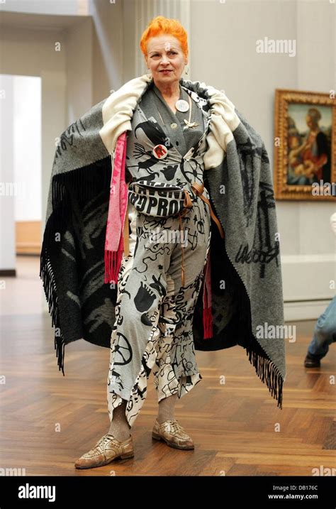 Britsh Fashion Designer Vivienne Westwood Poses At An Art Gallery Of