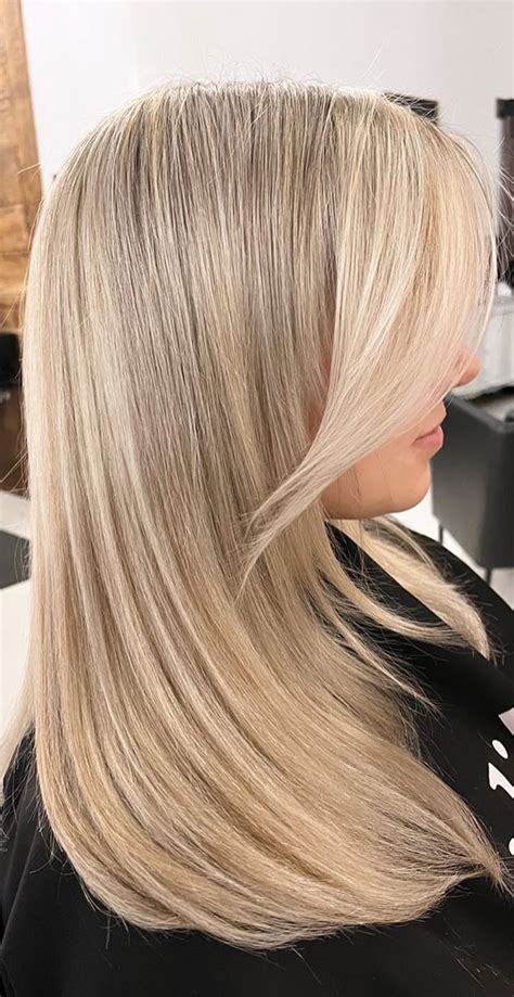 Champagne Blonde Straight Hair With Layers Curtain Bangs Old Money Blonde