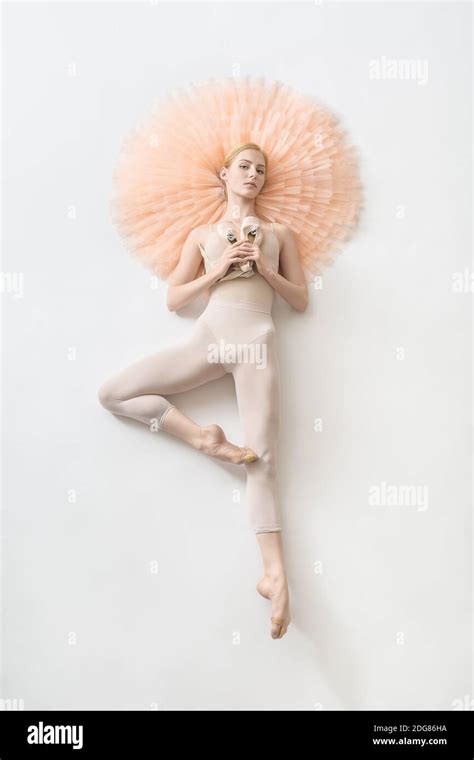 Blonde Ballerina Lies In Studio Stock Photo Alamy