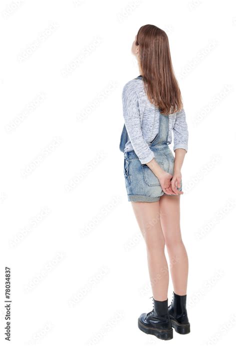 Teenage Girl Standing And Looking On Something Back Pose Full Stock