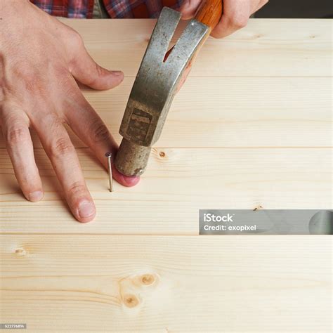 Hitting Finger With The Hammer Stock Photo - Download Image Now - Adult ...