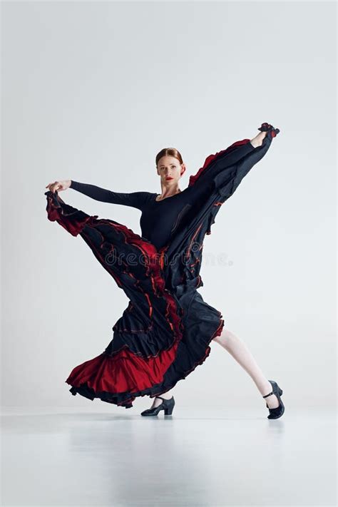 Focused And Fiery Flamenco Dancer Elegant Woman Performing Traditional