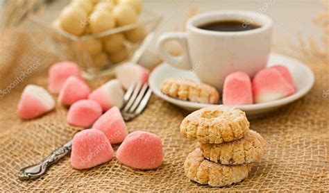 Sweet cookies and coffee. Stock Photo by ©alika 9459439