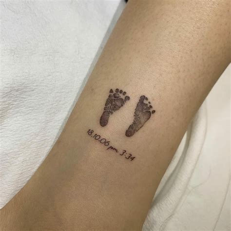 Tiny Footprint Tattoos