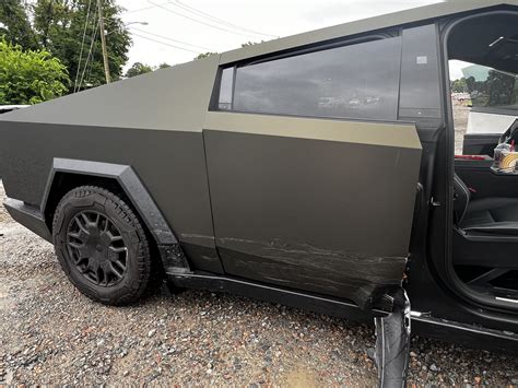 Tesla Cybertruck Gets T-Boned, Owner Discovers It's Surprisingly