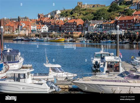 Pleasure And Fishing Boats On The River Esk Whitby North Yorkshire