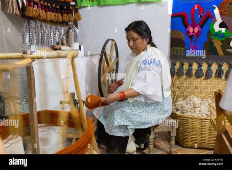 Ecuador Culture An Ecuadorian Mature Woman Using A Traditional Spinning Wheel Spinning Yarn To