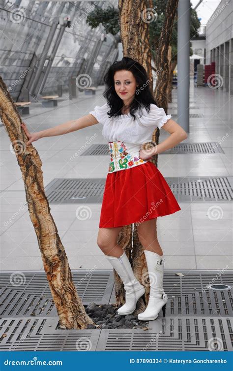 Pretty Smiling Brunette Ukrainian Girl In Red National Cloth Stock