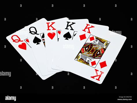 Playing cards showing a Full House poker hand Stock Photo - Alamy