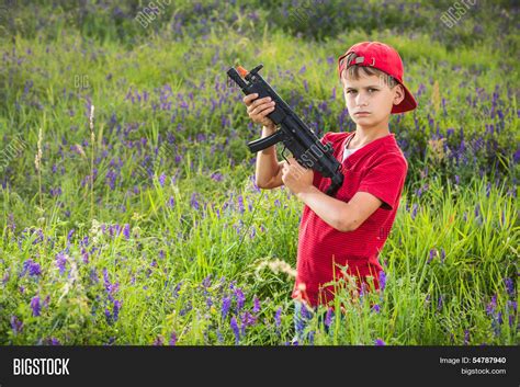 Boy Holding Gun Field Image And Photo Free Trial Bigstock