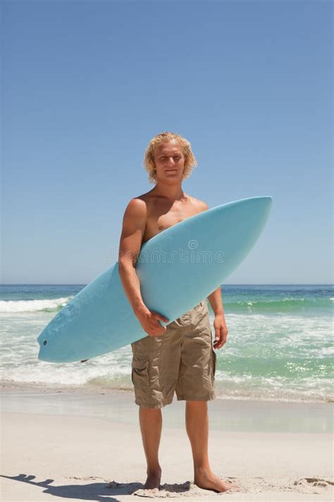 Overhead View Of A Blonde Man Lying On His Beach Towel Stock Photo Image Of Resting Cheerful