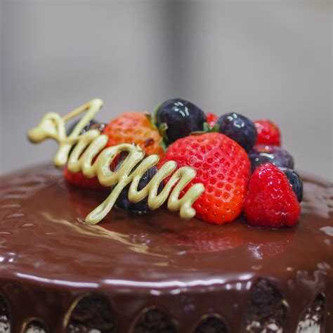 Dark Chocolate Frosted Drip Cake With Best Wishes Topping Written In