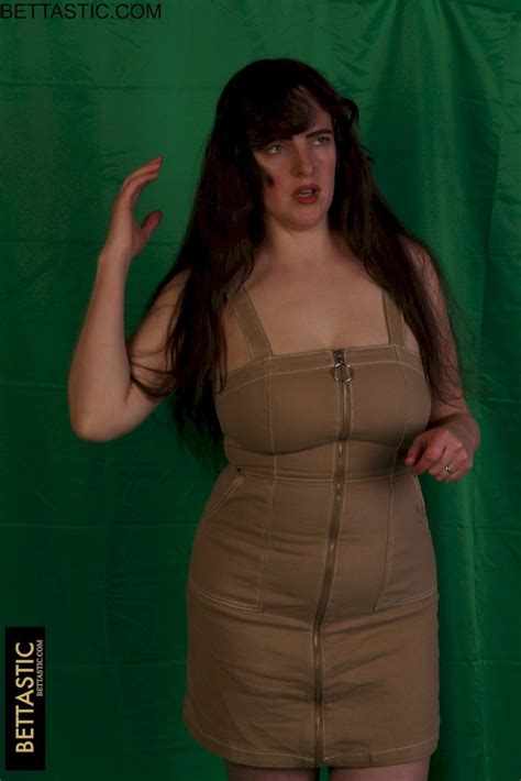 Hot Brunette Babe Showing Her Sexy Curves In A Dress 15 Photos