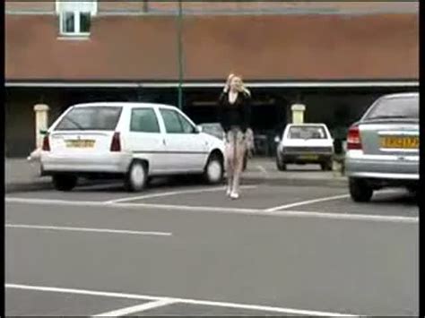 Blonde Babe Peeing Near Parking Lot