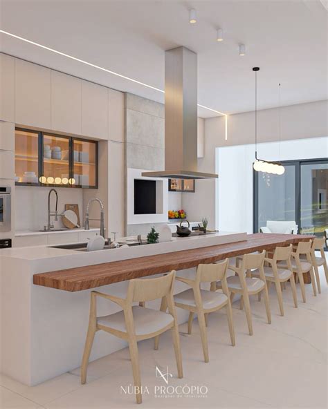 Cozinha Gourmet Cozinha nude ilha bancada em madeira maciça e iluminação em perfil de Led