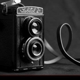 Old Fashioned Camera on Black Table