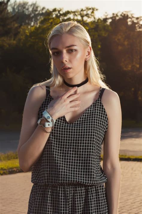 Pretty Tanned Blonde Woman In Black Romper Posing At The City In Stock Image Image Of Sensual