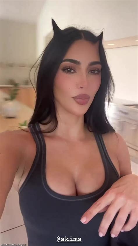 Kim Kardashian Showcases Her Famous Hourglass Curves In A Bright Blue Bikini Crop Top And
