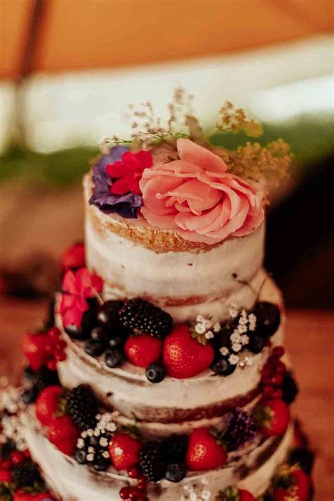 Rustic Semi Naked Wedding Cake With Berries And Flower Topper At Cadhay House Wedding