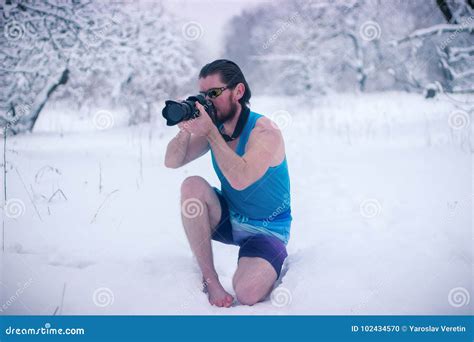 Naked Man With Camera Sit In The Winter Forest Stock Photo Image Of Model Muscle 102434570