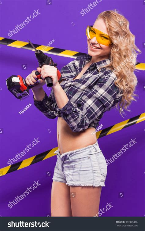 Sexy Blonde Construction Worker Screwdriver On Stock Photo Shutterstock