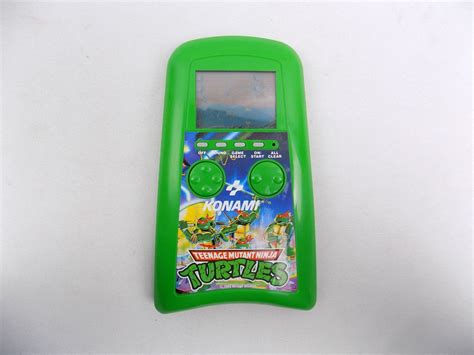 konami teenage mutant ninja turtles lcd handheld console starboard games