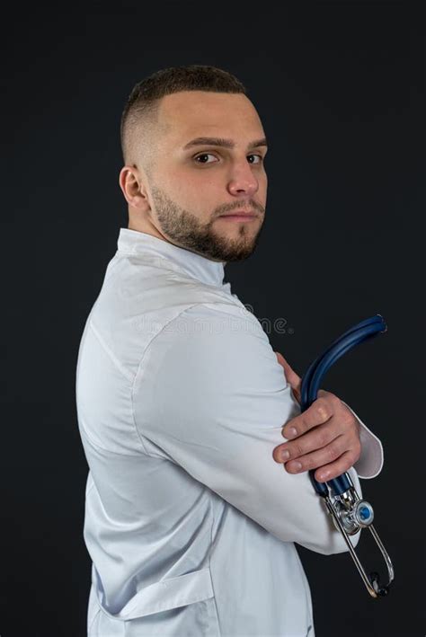 Male Physician In White Coat With Stethoscope Isolated Stock Photo