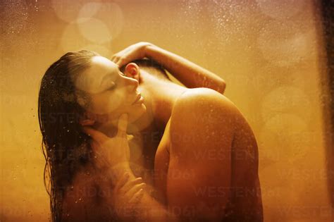 Nude Couple Kissing In Shower Stock Photo