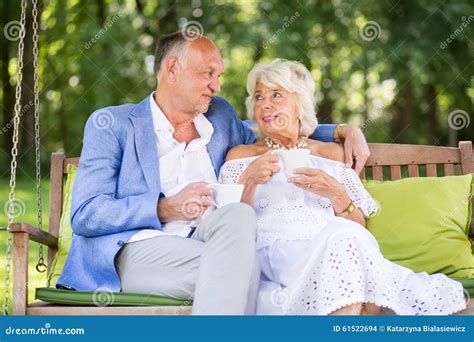 Mature Woman Relaxing With Partner Stock Photo Image Of Coffee Caucasian