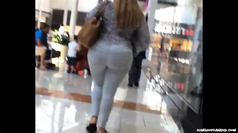 Latina Milf In White Jeans Strolling Down The Mall