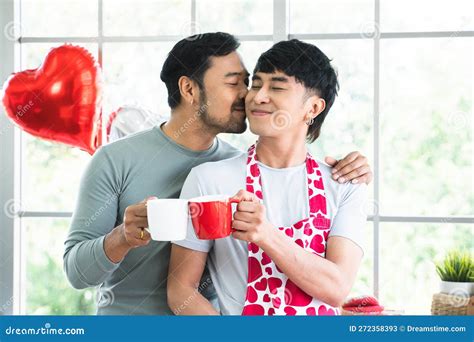 Lgbtq Gay Couple Handsome Men Kissing In Morning In Kitchen At Home While Have Breakfast