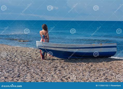 Beautiful Naked Female Photographer In The Dress Near Boat On The Sand Stock Image Image Of