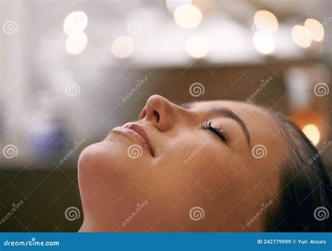 Total Relaxation Closeup Of A Young Womans Face During A Massage