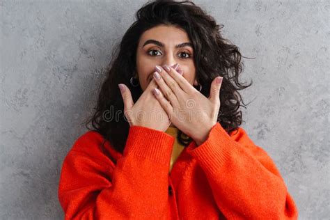 Happy Beautiful Brunette Girl Covering Her Mouth And Looking At Camera Stock Photo Image Of