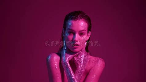 Naked Female Model With Perfect Skin And Natural Makeup Posing At White Studio Background Stock