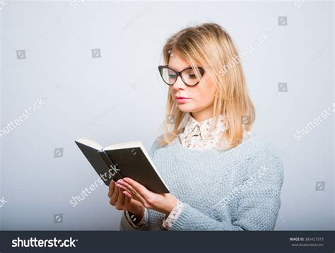 Beautiful Blonde Girl Reading Notebook Isolated Stock Photo 383427373 Shutterstock