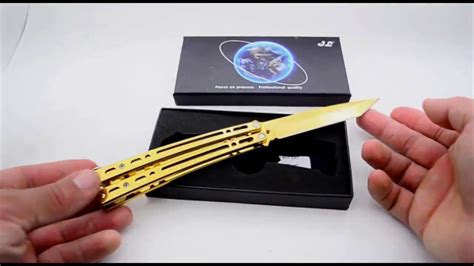 видео "Купить нож бабочку золотого цвета. Нож бабочка балисонг Видео ...