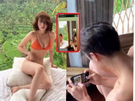 Ngọc Trinh gây sốt với clip vô tư chỉnh bikini trước mặt trai Tây cởi trần chụp ảnh