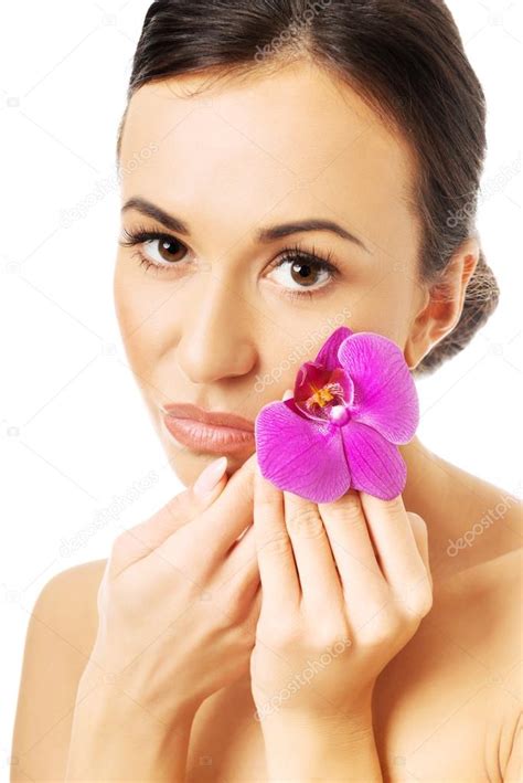 Naked Woman With Purple Orchid Petal Near Face Stock Photo By Piotr Marcinski 61428631