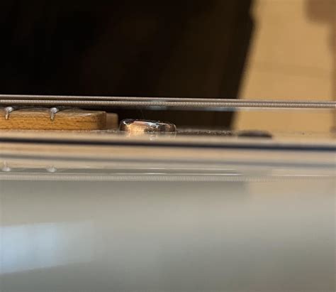 My neck pickup (cover?) Is tilted. Can’t seem to fix it. Does this