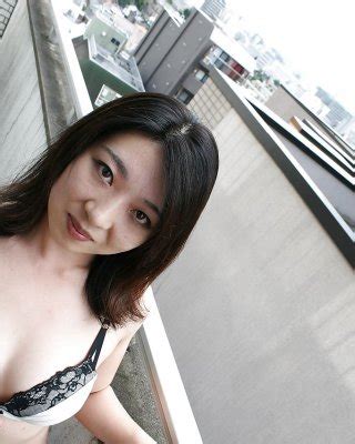 Asian MILF Naho Tajiri Taking Off Her Lingerie And Toying Her Hairy Gash Porn Pictures XXX