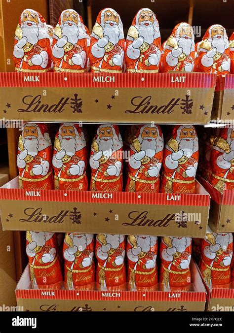 Group Of Lindt Chocolate Santa Claus Figures In A Supermarket Stock