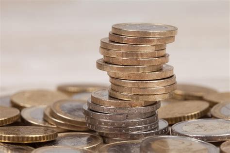 Premium Photo Close Up Of Coins Against White Background