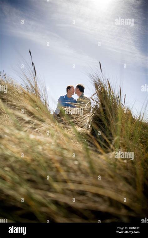 Gay Male Couple On Beach Hi Res Stock Photography And Images Alamy
