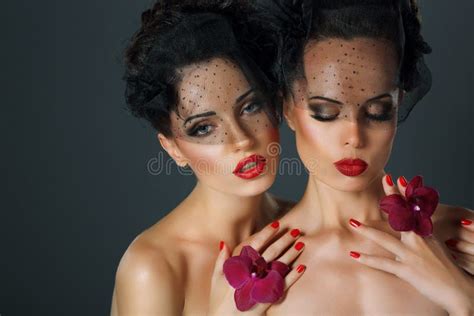 Sultry Beauty Attractive Naked Woman With Long Curly Hair And Wreath Of Flowers Stock Photo