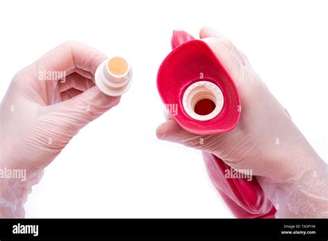 Nurse Wearing Sterile Rubber Gloves Holds Reusable Rubber Hot Water Bottle Classic Large