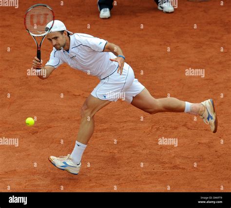 Germany S Nicolas Kiefer Returns A Forehand To France S Jeremy Chardy